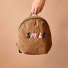 Lille rygsæk i fløjl – smil - icon